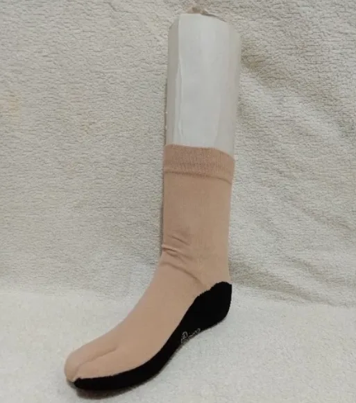 kaos kaki jempol